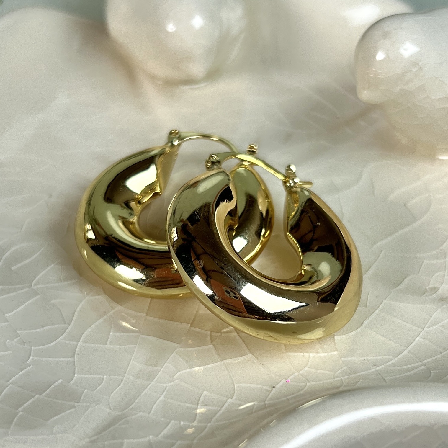 ARGOLLAS ENCHAPADAS EN ORO